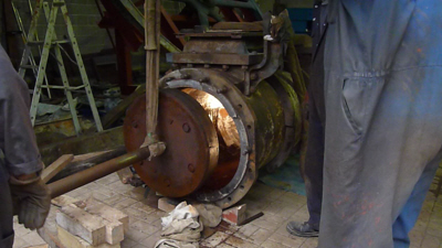 Removing HP piston (19.5ins diameter) from its cylinder.