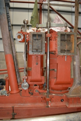 HP and LP slide valves fitted to their steam chests. The rod between the cylinders drives the valves up and down, and is operated by the ecc