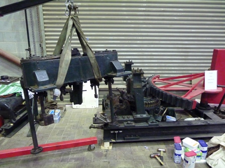 Lifting clear, the cylinder block.