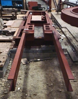 Cast iron entablature with 8” x 3” channel iron bolted to each side to replace the cut off section.