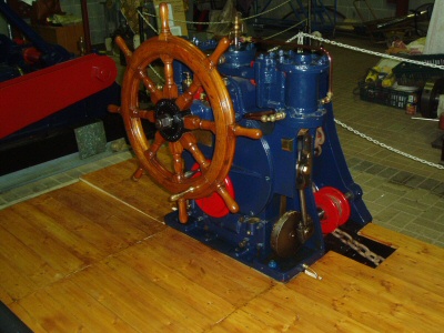 Steering engine with a restored ships wheel fitted.